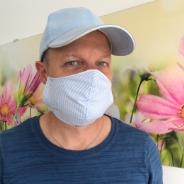 Tom from Essen works in distributions and wears a mask to minimise infection...