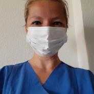 A song in her heart, a mask on her face: Dr. Susann Kobus, music therapist at...