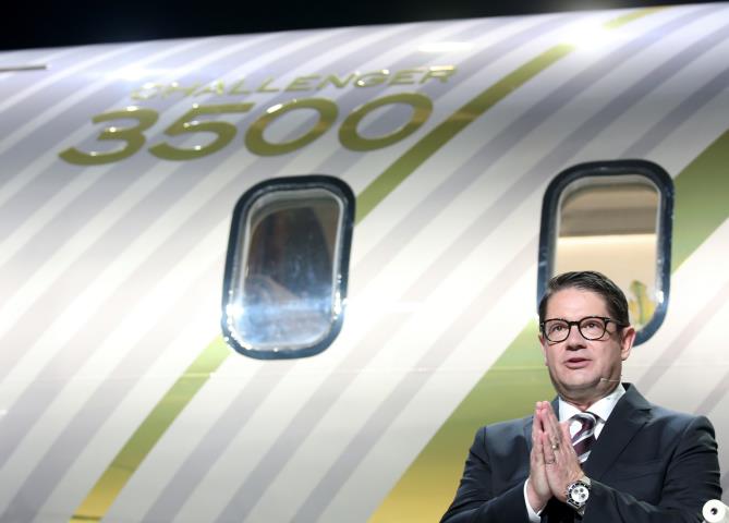 Bombardier Inc. President and Chief Executive Officer Eric Martel unveils a mockup of the company's new Challenger 3500 business jet at a virtual event in Montreal, Quebec, Canada September 14, 2021.  REUTERS/Christinne Muschi