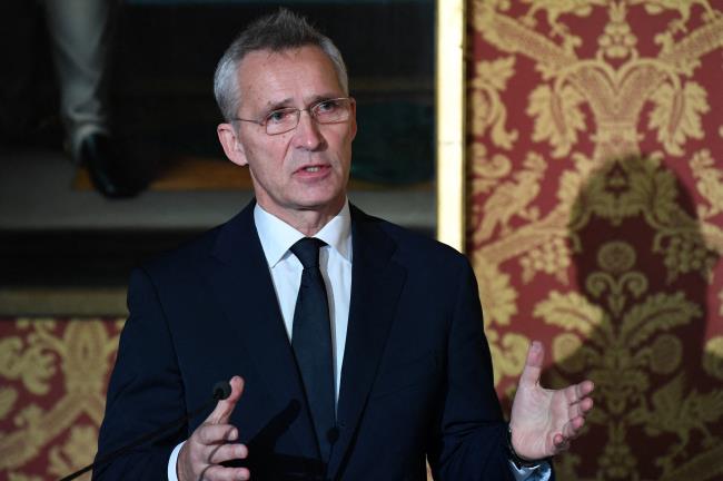 NATO Secretary General Jens Stoltenberg speaks at a news co<em></em>nference following a meeting with French defence and foreign ministers in Paris, France December 10, 2021. Bertrand Guay/Pool via REUTERS/Files