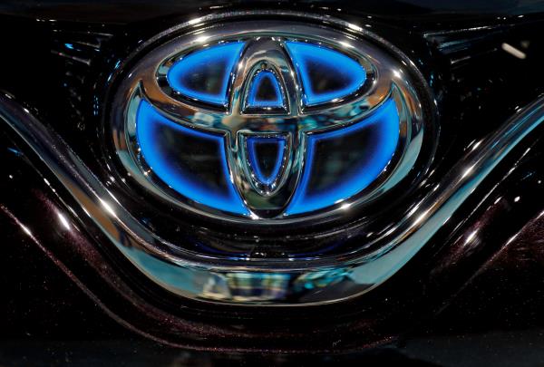 The Toyota logo is seen on the bo<em></em>nnet of a newly launched Camry Hybrid electric vehicle at a hotel in New Delhi