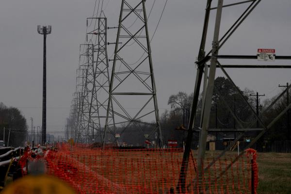 Overhead power lines are seen during record-breaking temperatures in Houston, Texas