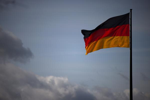 The German natio<em></em>nal flag flies in Berlin