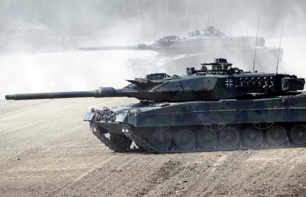 Leopard 2 tanks take position during a visit of German Chancellor Angela Merkel at NATO new spearhead force 