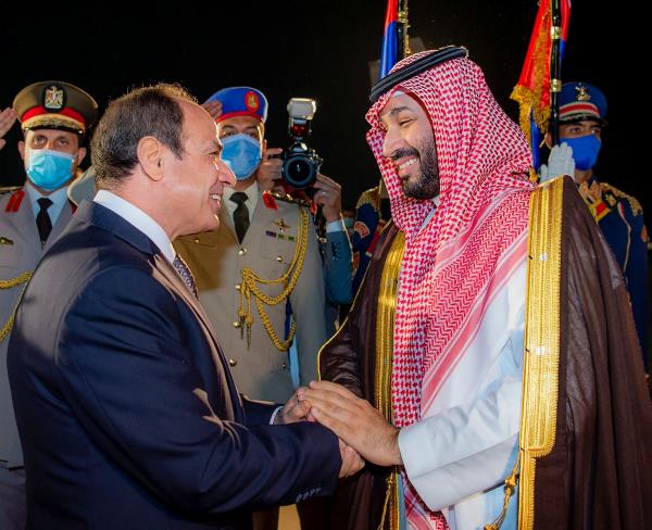 Saudi Crown Prince Mohammed bin Salman meets Egyptian President Abdel Fattah al-Sisi upon his arrival in Cairo