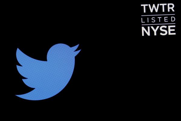 The logo for Twitter is displayed on a screen on the floor of the NYSE in New York