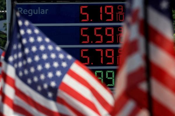 Gasoline prices are displayed at gas station in New Jersey