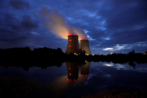 Steam rises from cooling towers of the Electricite de France (EDF) nuclear power station in Belleville-sur-Loire
