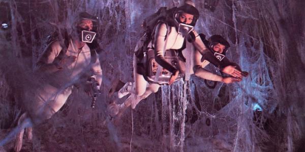 The Crew Swiming in a Human Body in Fantastic Voyage