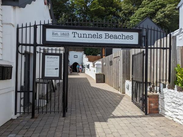 A sign for Tunnels Beaches in Devon