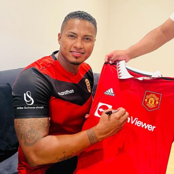 Valencia flexed his guns while advertising a United jersey up for grabs
