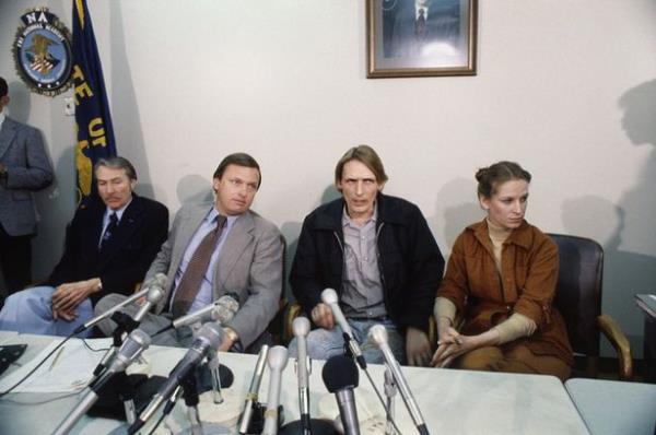 FBI agent Ralph Himmelsbach (L) agent Wm Baker seated with Mr & Mrs Harold D. Ingram during press co<em></em>nference on recovery of the D.B. Cooper hijacking (1971) mo<em></em>ney they found while on a family outing on the shore of the Columbia River.
