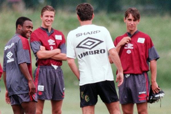 Manchester United in their first day of training. Assistant manager Brian Kidd talks to players left to right: Andrei Kanchelskis, Paul Parker, David Beckham, Gary Neville, Nicky Butt and Brian McClair 13th July 1995.