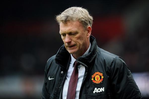 David Moyes manager of Manchester United looks dejected during the Barclays Premier Leauge match between Manchester United and Liverpool at Old Trafford on March 16, 2014