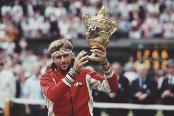 Bjorn Borg lifts the Wimbledon trophy