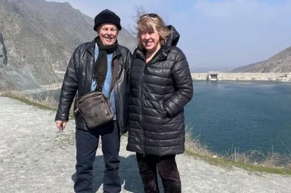 Dr Anna Phillips, pictured with her husband, thought she was being scammed