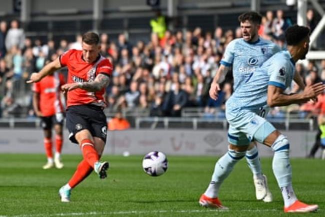 Luton’s Ross Barkley shoots at goal against Bournemouth