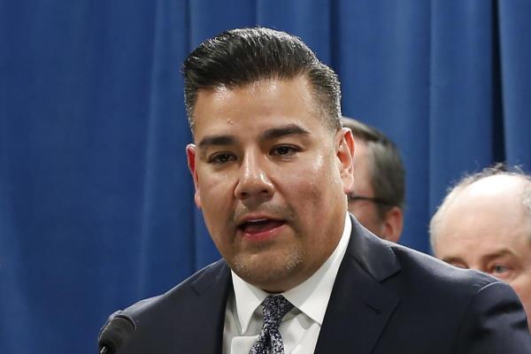 California Insurance Commissio<em></em>ner Ricardo Lara speaks at a news conference