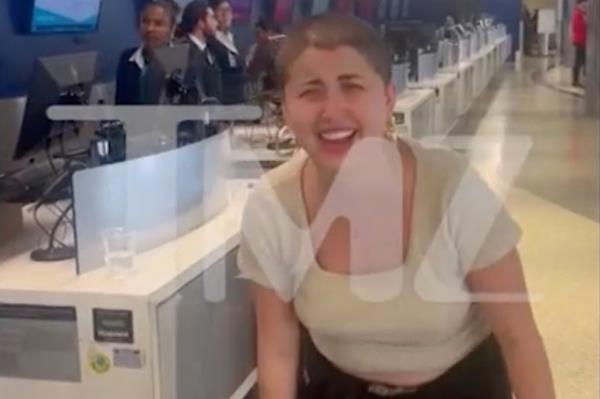 The woman broke out into laughter after she realized she was in the wrong terminal at the end of the tirade