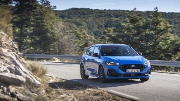 2024 Ford Focus ST Edition, blue, front right three-quarters, driving