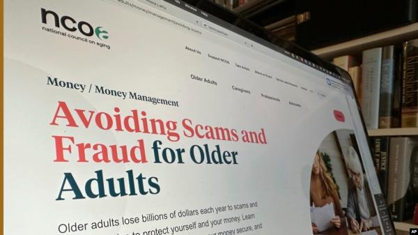 FILE - A page with information for older adults on how to avoid being scammed is displayed on the Natio<em></em>nal Council on Aging website in this photo taken Nov. 9, 2023, in New York.