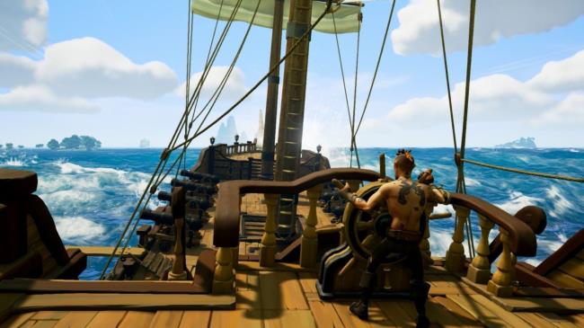 Sea of Thieves player sailing on their boat on the seas.