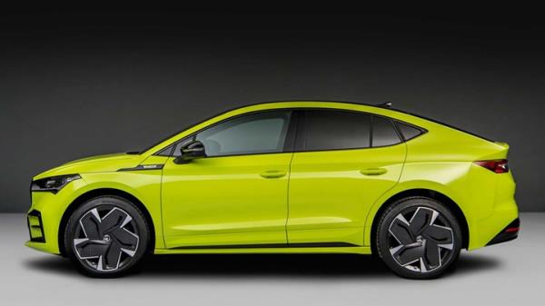 Skoda Enyaq vRS: updated 2024 model, rear three quarter driving, green paint