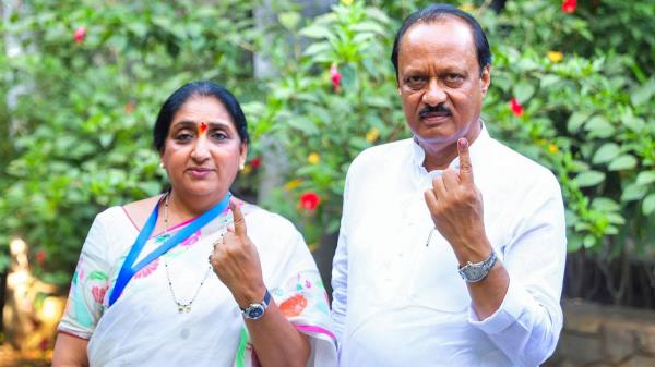 Maharashtra Dy CM Ajit Pawar shows his inked finger after voting at a polling station during the third phase of Lok Sabha polls, at Katewadi in Baramati.
