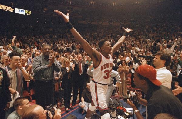 Patrick Ewing celebrates after the Knicks eliminated the Pacers in the 1994 Eastern Co<em></em>nference Finals and advanced to the NBA Finals. 