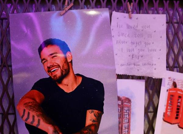 Tributes to Liam Payne, a former One Direction band member, are seen in Piccadilly Circus, in London, Britain, October 18, 2024.