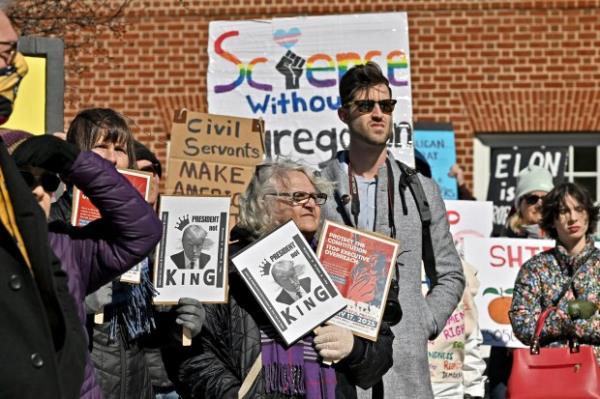 The crowd listens as Anne Arundel County Executive Steuart Pittman gives remarks. Protesters rally on President's Day at Lawyers Mall in Annapolis against the policies of President Do<em></em>nald Trump and Elon Musk as part of the natio<em></em>nwide "50501" Movement. (Paul W. Gillespie/Staff)