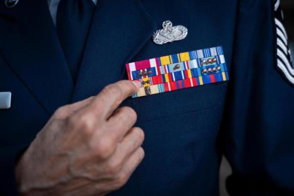Calvin Stevens, Air Force Reserve Veteran, displays his awards and decorations