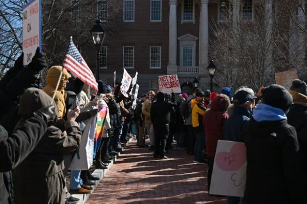 Rally marshal, emcee and self described "town crier" Erik Berg speaks to the crowd. Protesters rally on President's Day at Lawyers Mall in Annapolis against the policies of President Do<em></em>nald Trump and Elon Musk as part of the natio<em></em>nwide "50501" Movement. (Paul W. Gillespie/Staff)